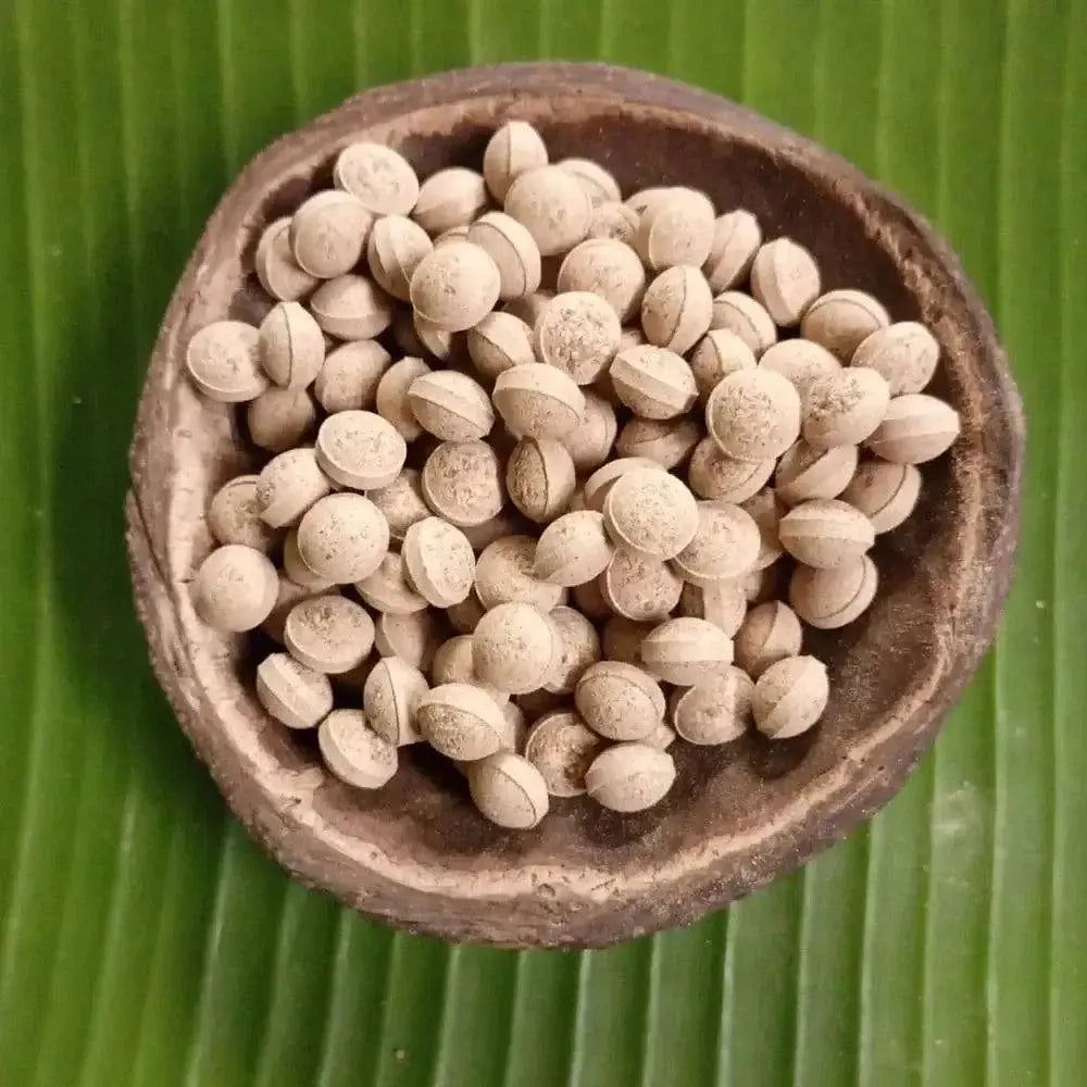 Amla fruit tablets in a bowl, rich in Vitamin C, boosts immunity.