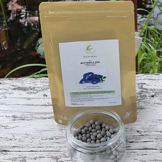 GREENVITALITY Butterfly Pea Flower natural antioxidant supplement, 45g package on rustic table.